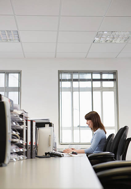 istock Businesswoman Working On Desktop PC In Office 505721741