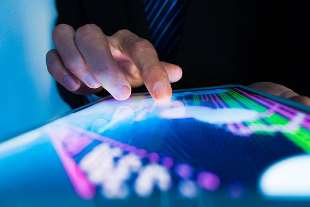 Market Analyze Market Analyze with Digital Moniter focus on tip of finger human finger stock pictures, royalty-free photos & images