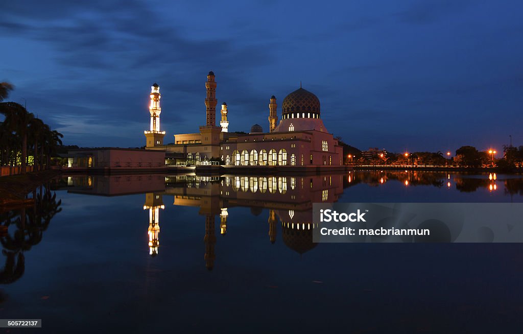 Reflection of Kota Kinabalu city mosque at dawn Reflection of Kota Kinabalu city mosque at dawn in Sabah, East Malaysia, Borneo Arabic Style Stock Photo
