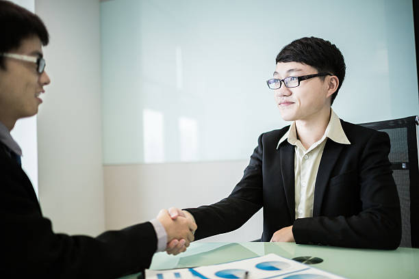 istock businessmen shaking hands 505725125