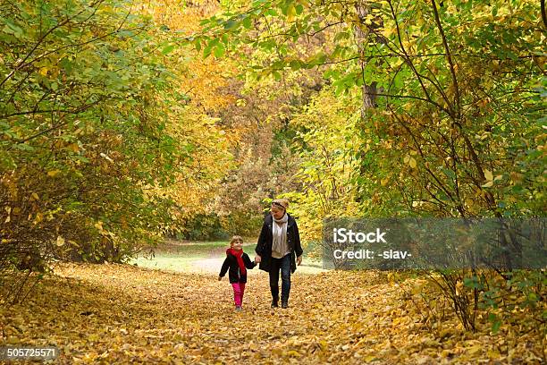 Autumn Walk Stock Photo - Download Image Now - Alley, Family, Smiling
