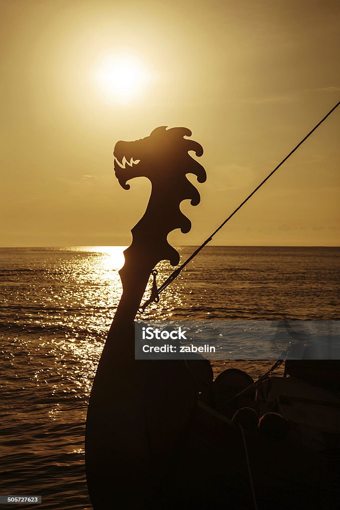 Drakkar Viking drakkar at open sea at sunset Viking Ship Stock Photo