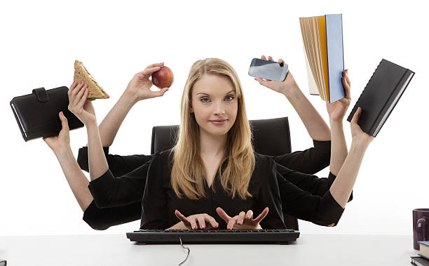 istock busy woman at her desk 505727643