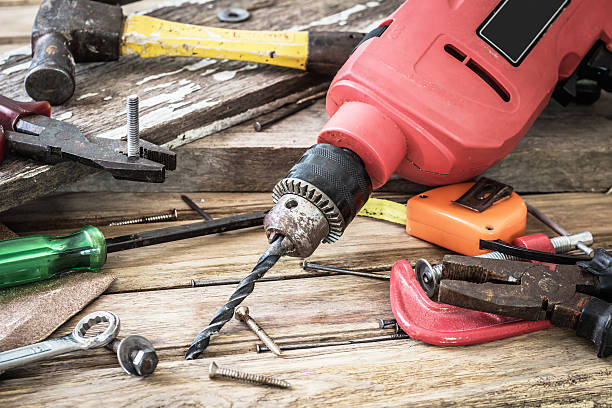 istock Dirty set of hand tools on a wooden panel 505746216
