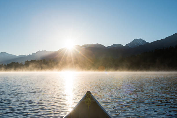 istock Canoeing on a prisitine mountain lake 505752172