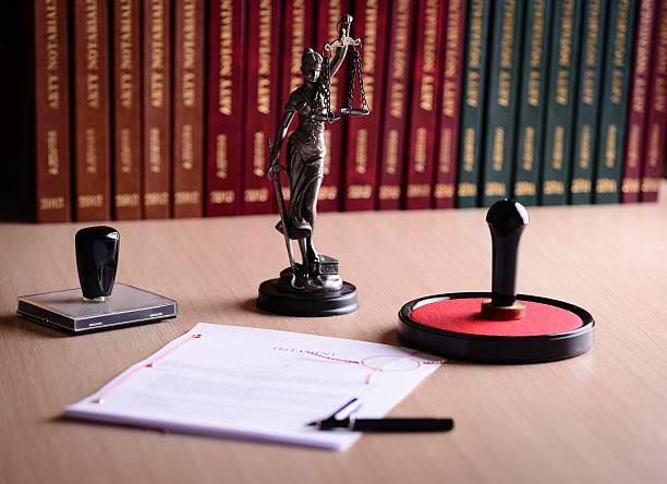 Document waiting for a notary public sign on desk Document waiting for a notary public sign on desk. Notary public accessories shorthand stock pictures, royalty-free photos & images