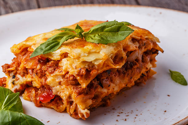 istock Traditional lasagna made with minced beef bolognese sauce. 505754820