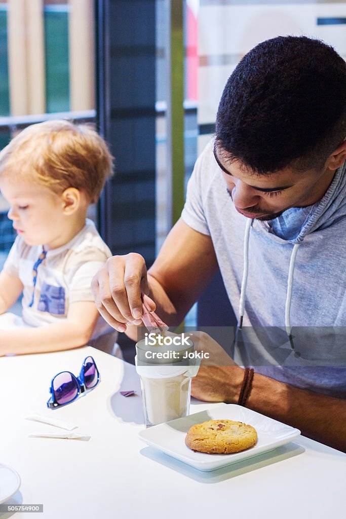 Relationship between father and son. Precious family moments. Adult Stock Photo