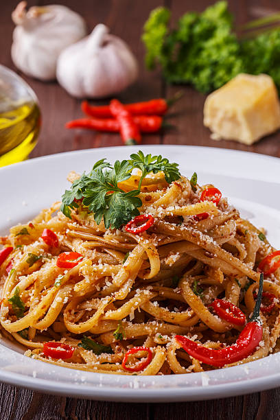 istock Homemade linguine pasta in arrabbiata sauce. 505755496