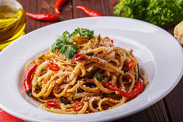 istock Homemade linguine pasta in arrabbiata sauce. 505755596