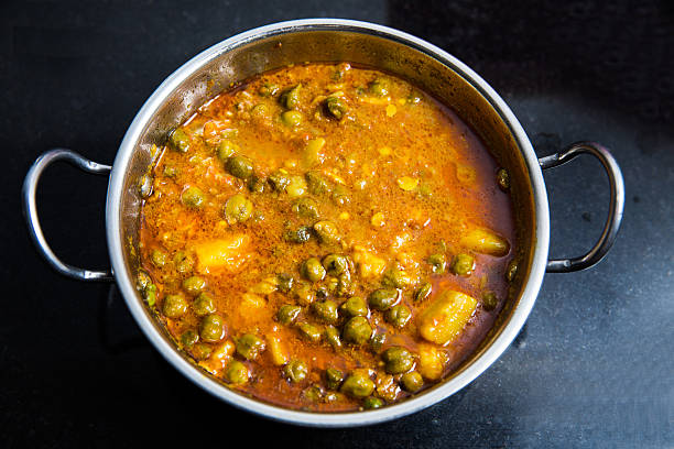 istock indian dish green gram with toamto curry and potatoes 505755810