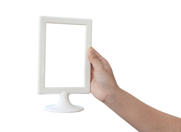 istock woman hand holding a blank menu frame 505757804