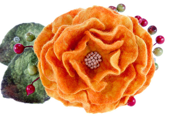 istock orange rose flower image made from wool 505766561