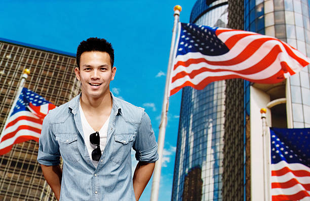 istock Smiling man standing in front of city 505766711