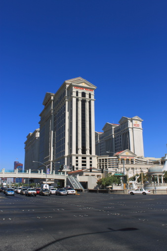 Las Vegas, Nevada, USA - July 3, 2012: Caesars Palace Hotel and Casino towers over the famous Strip. Opened in 1966, the hotel has 3,960 rooms and the casino 166,000 square feet of gaming.
