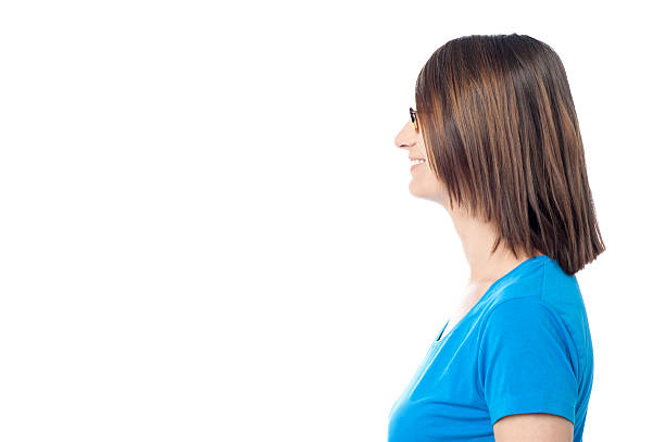 istock Happy middle aged woman, side pose 505769689