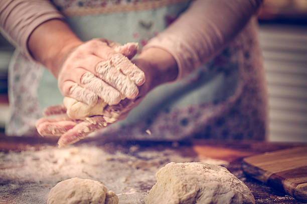istock Kneading Dough with Hands On the Table 505770966