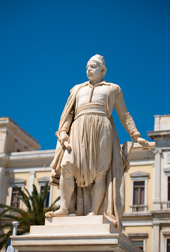 Statue of greek hero, Andreas Miaoulis, in front of the Town Hall of Ermoupolis, in Syros island, Aegean, Greece.