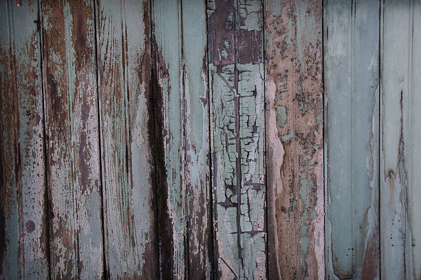 Peeling Blue Paint on Old Wooden Boards stock photo