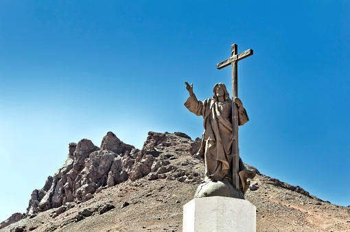 Christ Redeemer of the Andes, located on the border of Argentina and Chile to 3854 meters above sea level on The Andes range.
