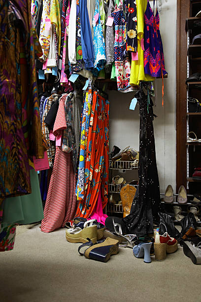 istock Crowded Clothing Racks And Piled Shoes 505773637