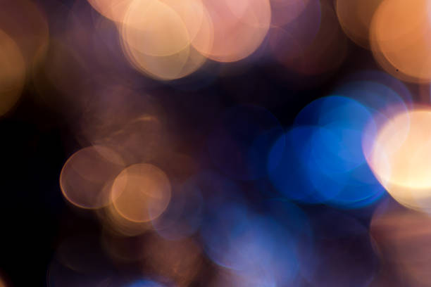 istock Photo of bokeh lights on black background 505773706