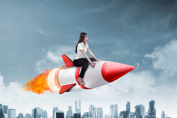 istock Asian business woman flying ride rocket 505773718