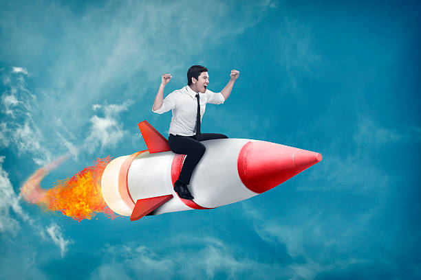istock Asian business man flying ride rocket 505773760