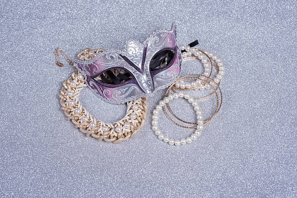istock carnival mask  and jewelry with pearls   on glitter 505778548