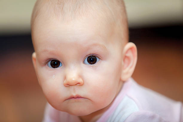 istock Close-up of a small child who cries but does 505779282