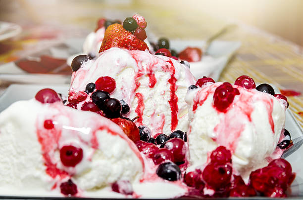 istock delicious vanilla ice cream with fruit in plate 505792730