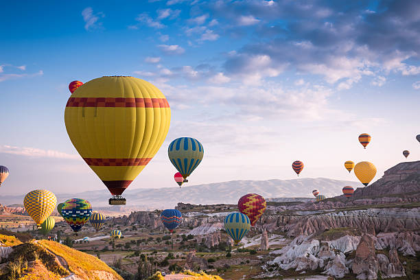 istock Hot air balloons fly over Cappadocia 505793434