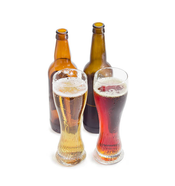 istock Two beer glasses and two bottles of various beer 505794132