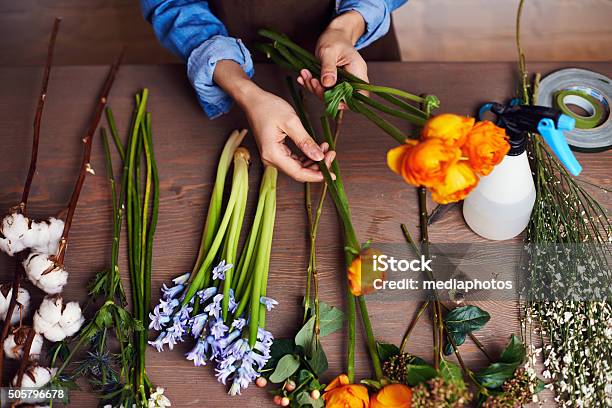 Working With Flowers Stock Photo - Download Image Now - Flower Arrangement, Florist, Flower Shop