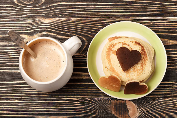 istock stack of pancakes on wooden board 505797462