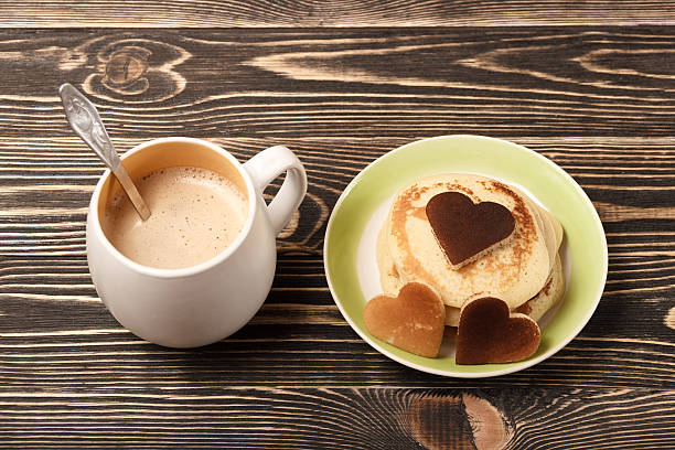 istock stack of pancakes on wooden board 505797490