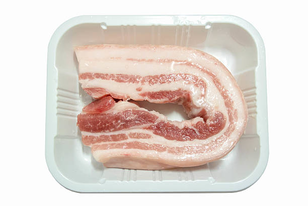 istock streaky pork in plastic tray package 505798434