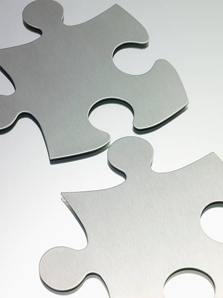 Two blank jigsaw puzzle pieces Two blank jigsaw puzzle pieces things that go together stock pictures, royalty-free photos & images
