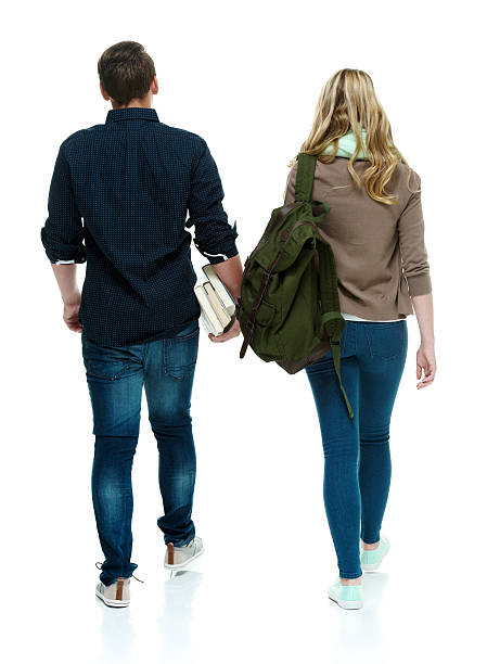 istock Rear view of students walking 505800994