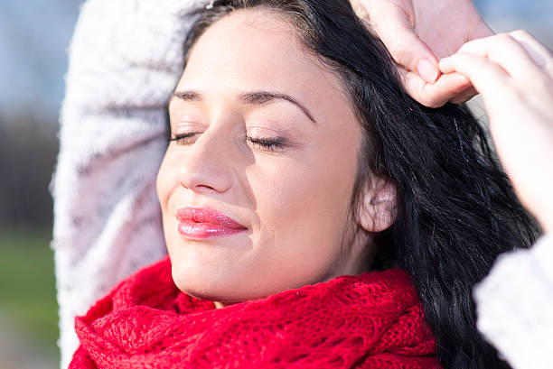 istock Young woman with red scarf 505801144