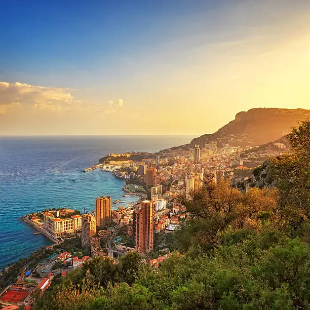 Monaco Montecarlo cityscape, principality aerial view. Skyscrapers, mountains and marina. Azure coast. France, Europe.