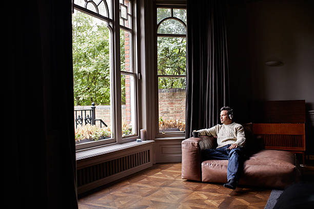 istock Enjoying his morning coffee and music 505801626