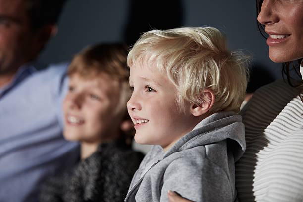 istock Enjoying a family tv night 505802252