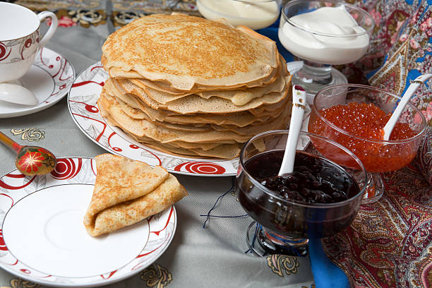 istock Pancakes with red caviar, jam, cream 505802388