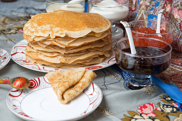 istock Pancakes with red caviar, jam, cream 505802652