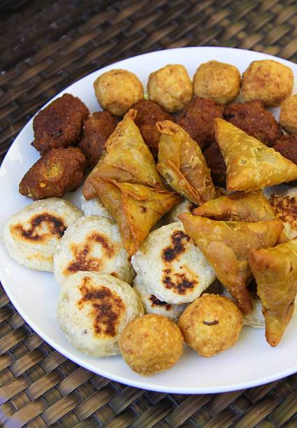 Local Samosas and Fried finger food Local Samosas and Fried finger food maldivian culture stock pictures, royalty-free photos & images