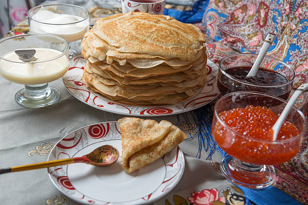 istock Pancakes with red caviar, jam, cream 505803298