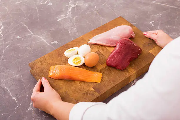 Photo of Woman getting ready to prepare nutritious dinner