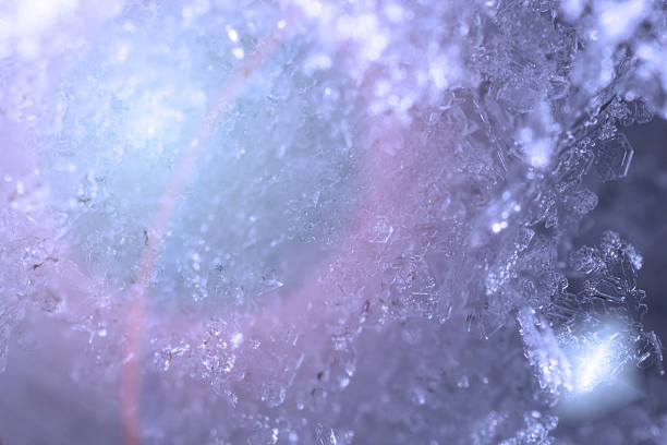 istock snow crystals abstract background macro photo 505805562