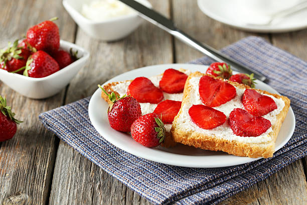 istock Fresh toast with strawberry on grey wooden background 505805738